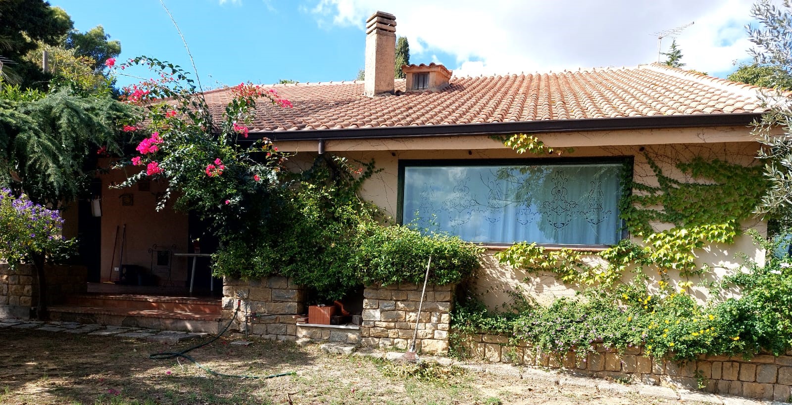 Villa dal fascino rustico e stile inconfondibile